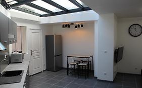 Appartement atypique avec véranda en centre ville